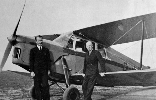 Eric Pasold, left, and Ladybird factory manager Mr Hurst with de Havilland Hornet Moth G-AEKS at Denham.