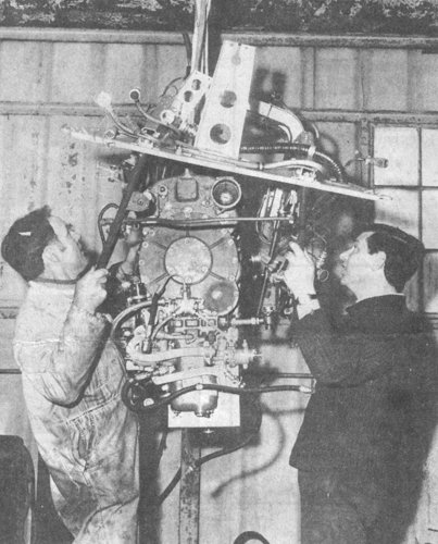 Harry Elkin and Owen Cubitt prepare the new Argus engine for fitting into the Messerschmitt Me 208.