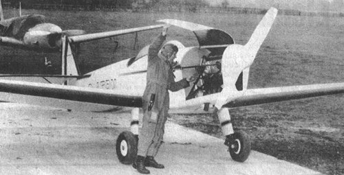 Harry Elkin readies the de Havilland dH.84 Moth Minor for its delivery flight to Scotland in May 1974. His Messerschmitt Me 208 is in the background.