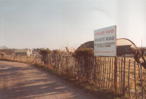 Looking along Hangar Road from the western end, past the hangars in January 1978. The road allowed supply trucks to access the aerodrome's hangars and workshops.