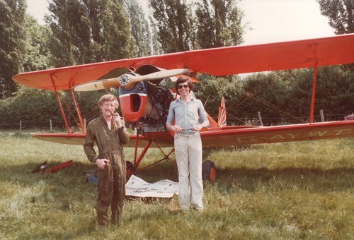 Brian Lecomber, left, working on his Stampe SV.4C, G-AYWT at Denham in 1978. Brian's third book had just been published.